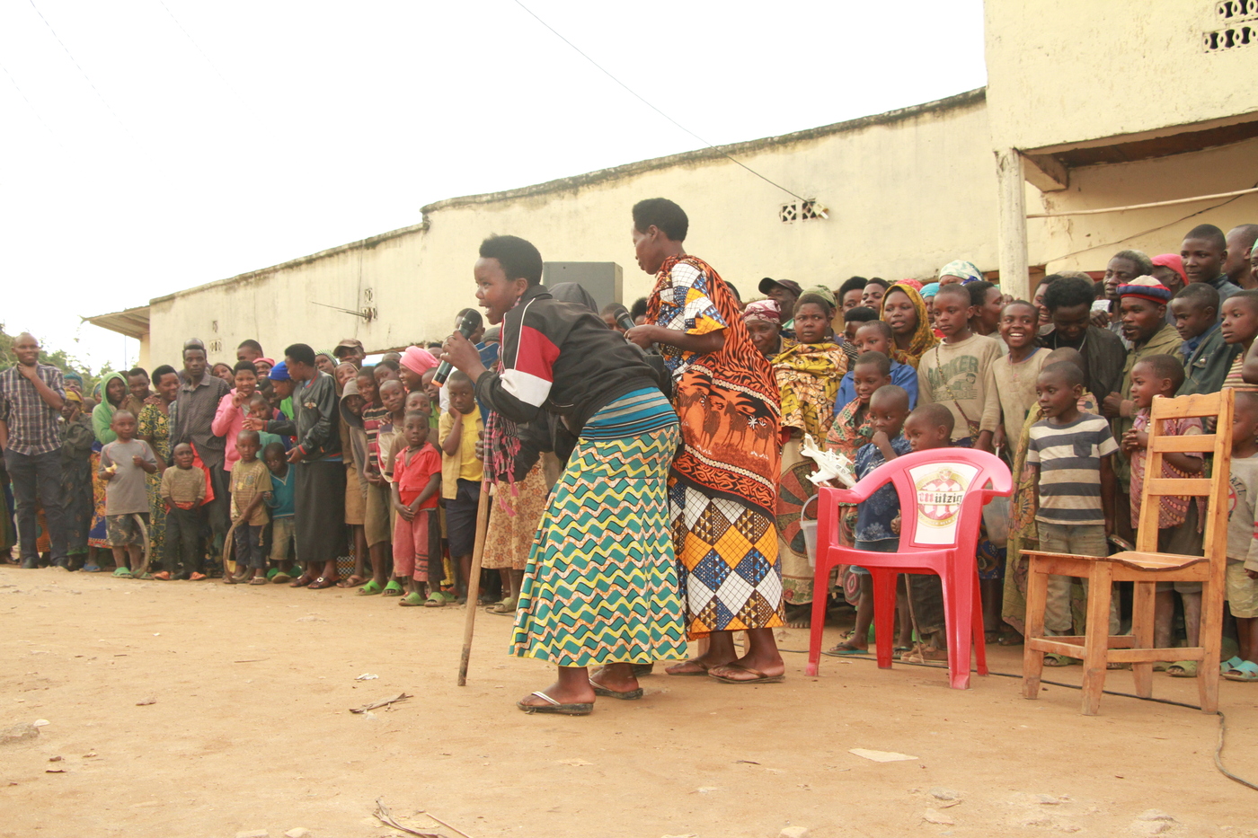 Community gathering watching a THT drama performance in Rwanda
